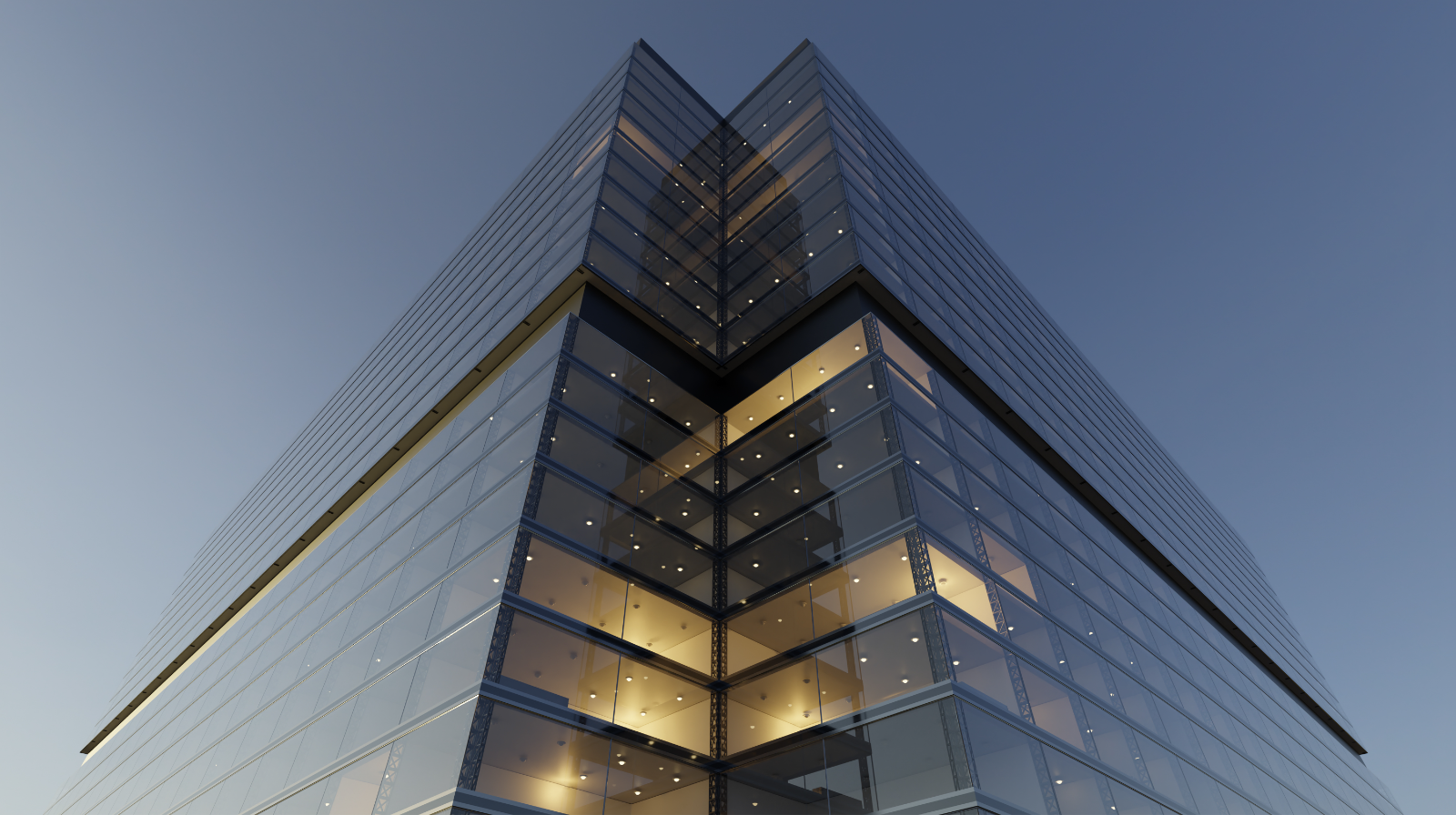 Glass office building seen from below at dusk — the demonstration asset